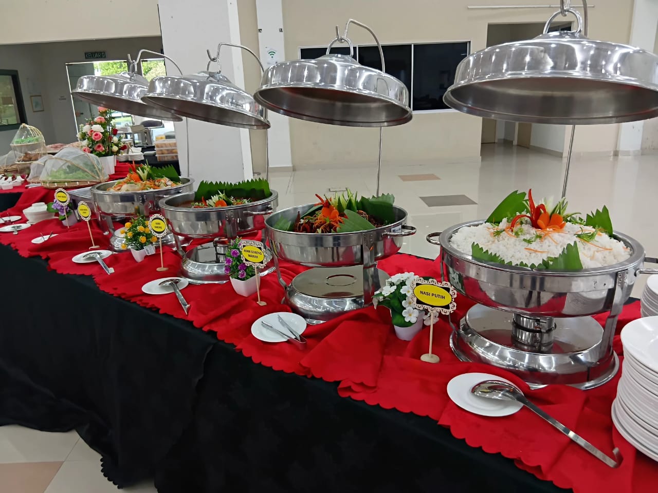 Buffet catering line with rice and dishes
